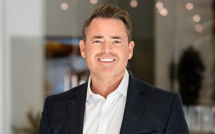 Clint Menfenee Headshot