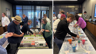 Photo of New Shared Mobility Summit attendees exploring interactive community engagement options