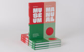 Building a Museum: This is Not a Manual books in a stack - SmithGroup