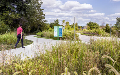 Photo of multi-use trail and native landscape at West Park, Carmel, Indiana